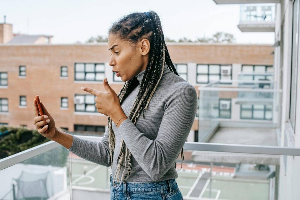 woman fighting with her partner in a toxic relationship on the phone